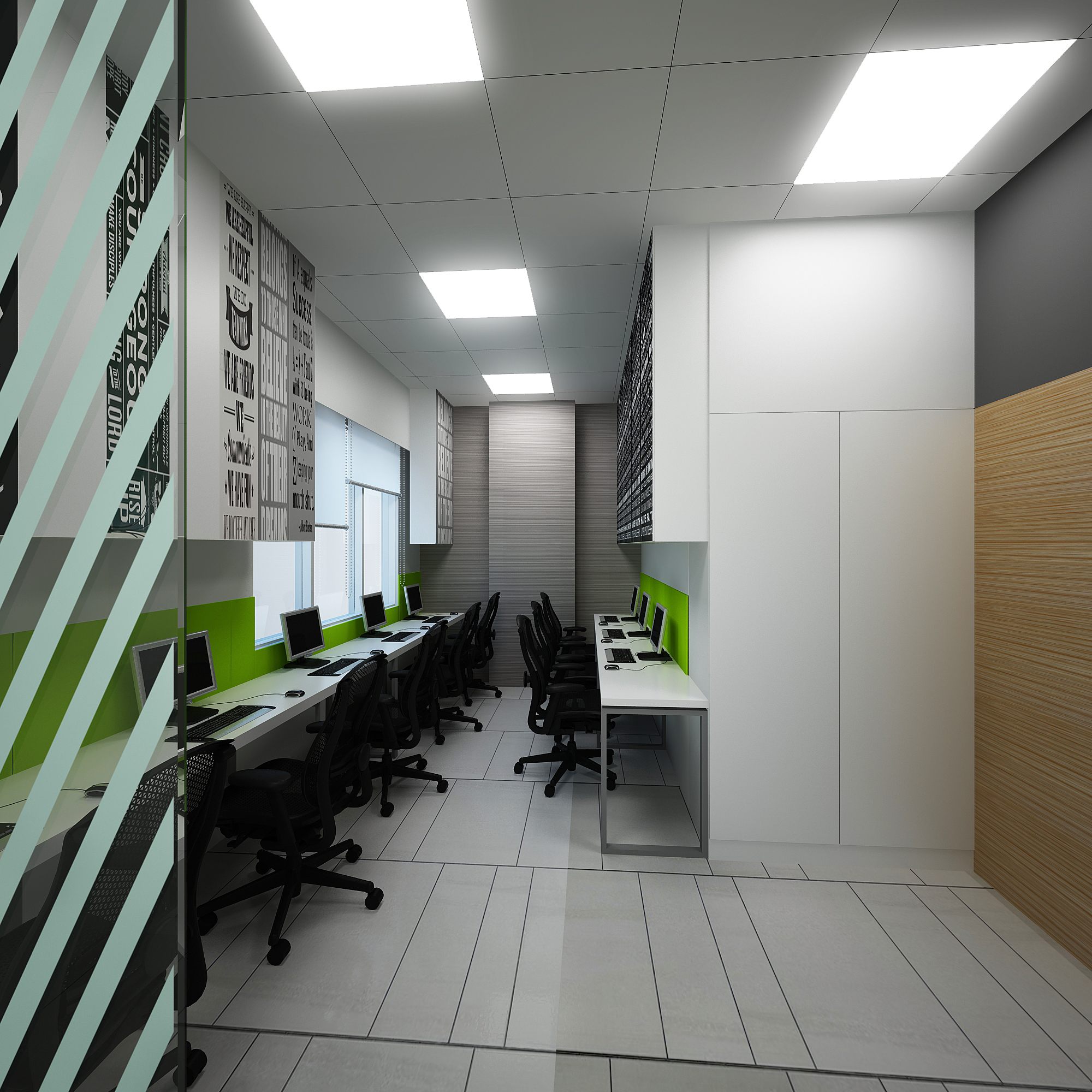 Narrow workstation bay with green accent splashbacks and monochrome typographic mural wall.