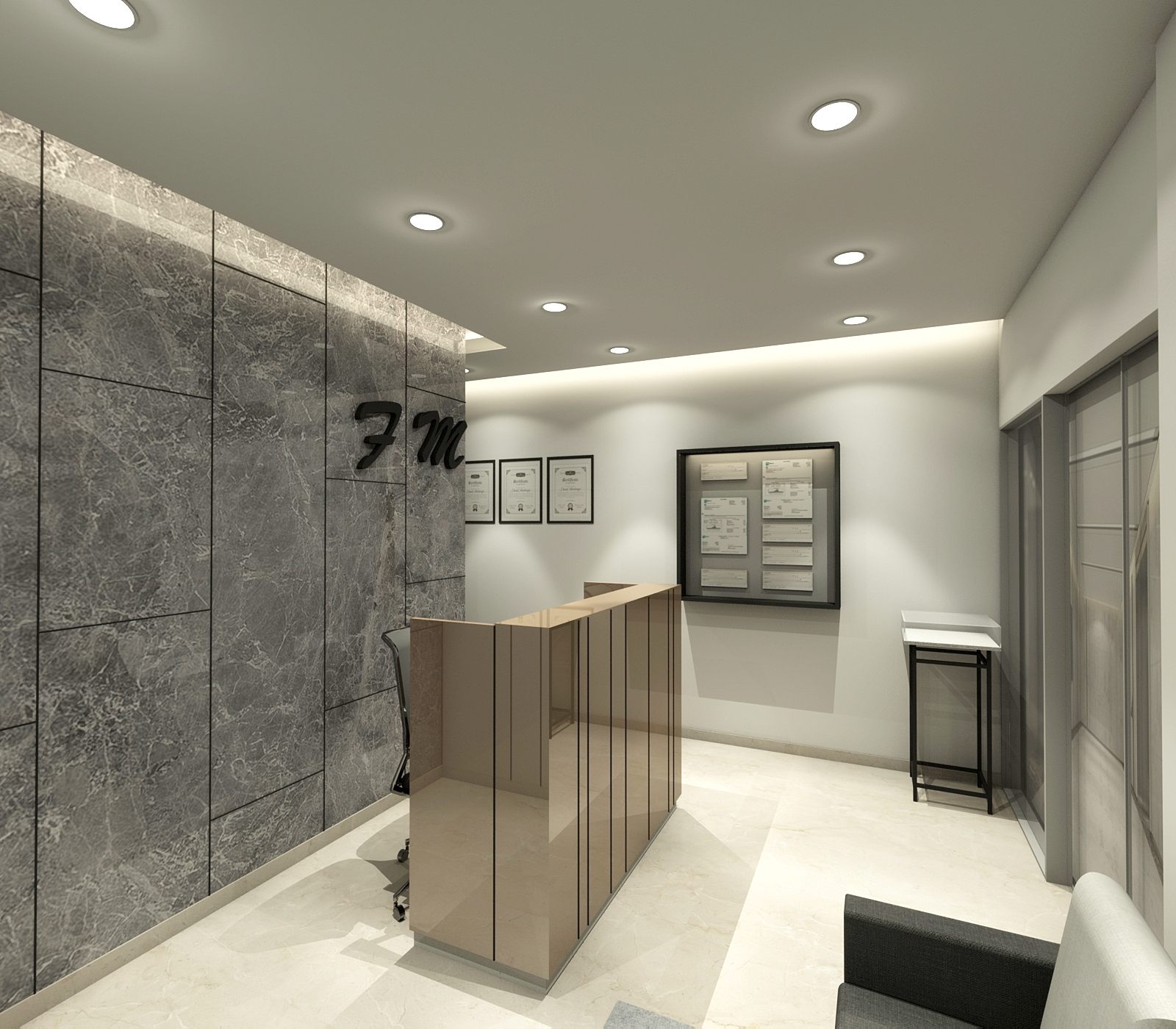 Reception with grey marble feature wall, Fox Mandal Solicitors & Advocates signage and FM monogram.