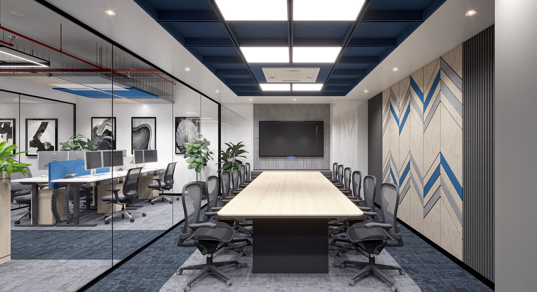Small meeting room with a white table, grey mesh chairs and a navy accent wall with pixel graphics and a wall TV