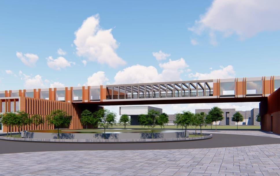 Render of the institute campus showing the red-brick academic block beside a large white space-frame-roofed hall.