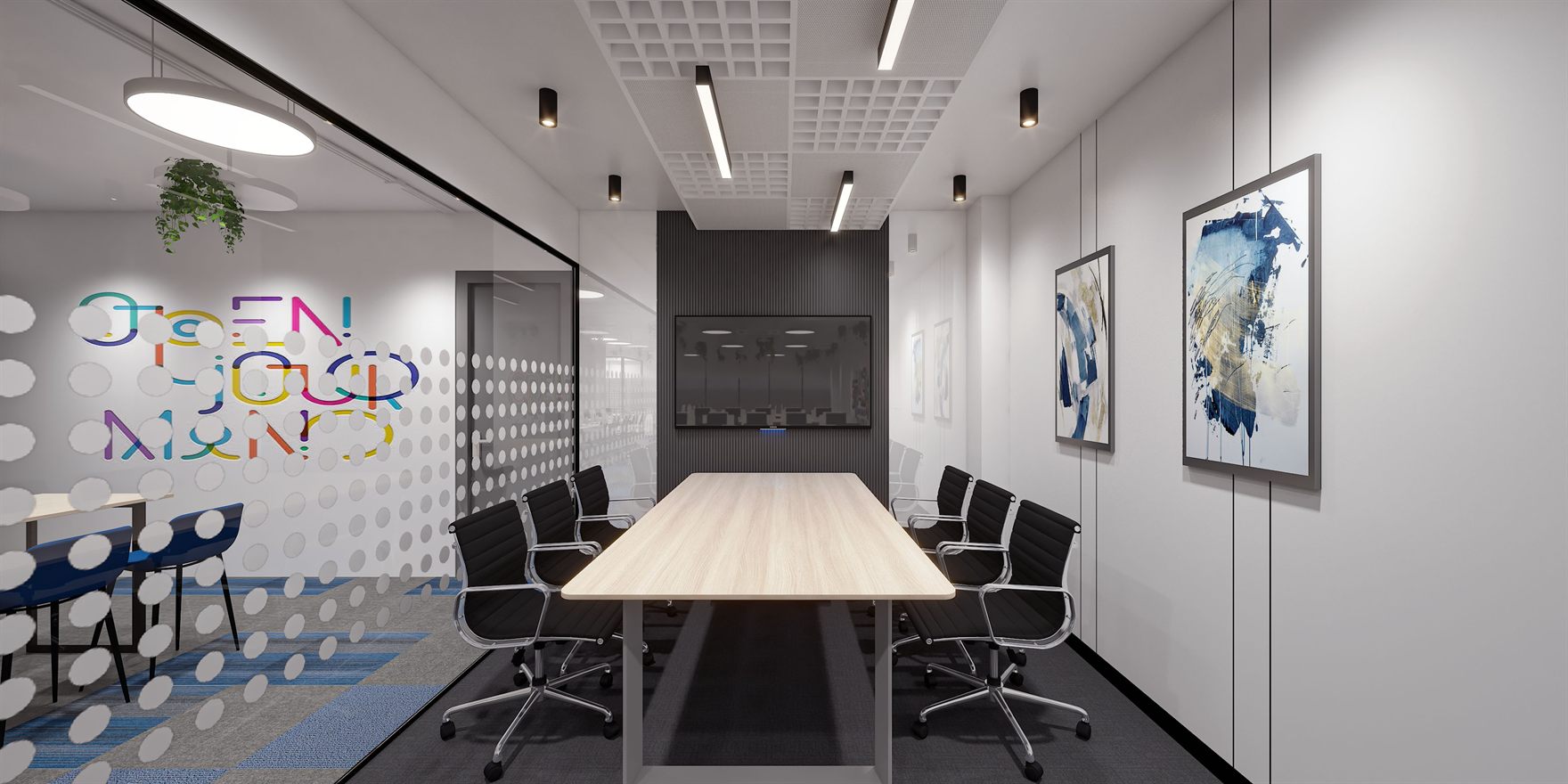 Pantry with grey cabinets, a blue sofa and high stools at a wood table below a colourful OPEN YOUR MIND graphic