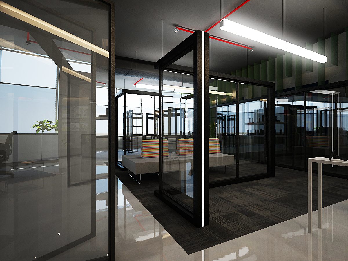 Glass-walled breakout pod with timber-and-orange bench seating amid dark-framed glazed partitions and red ceiling accents.