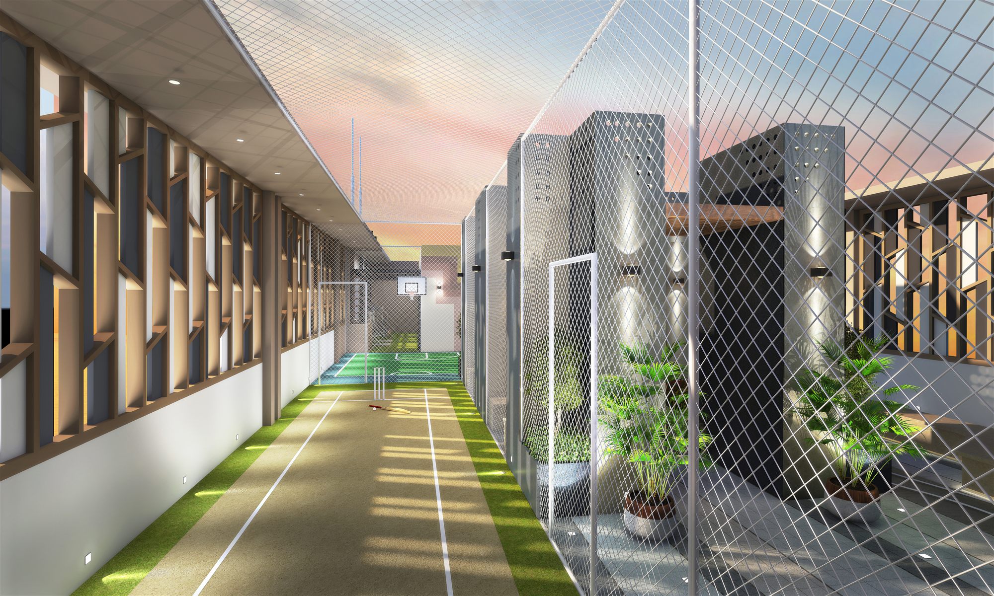 Indoor multipurpose sports corridor with turf cricket pitch, net enclosure and slatted wall detailing.