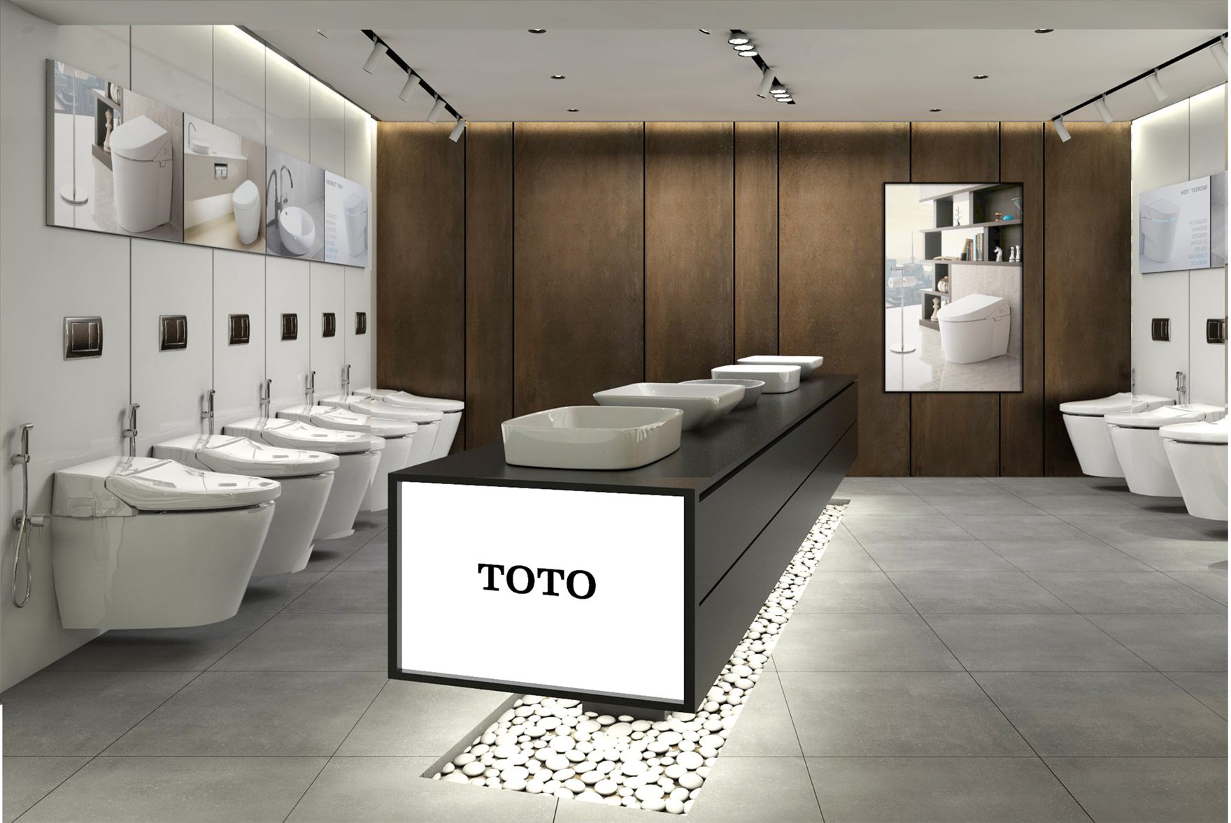 Wall-hung toilet display flanking a black island counter topped with vessel basins against a bronze-panelled feature wall
